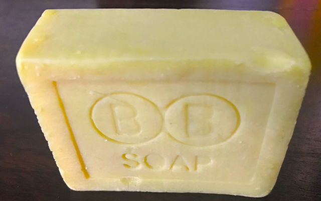The cake, BB face: Every cake is stamped BB SOAP inside a border.