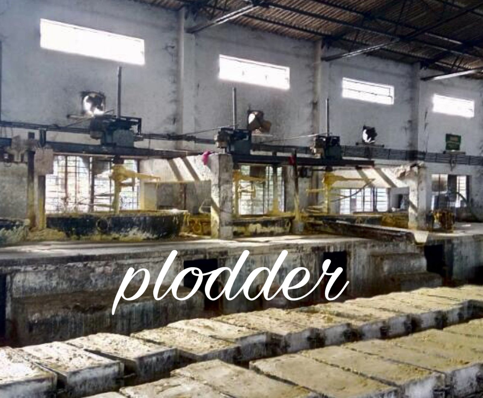Soap set in frames on the factory floor beside the plodder at Wagholi