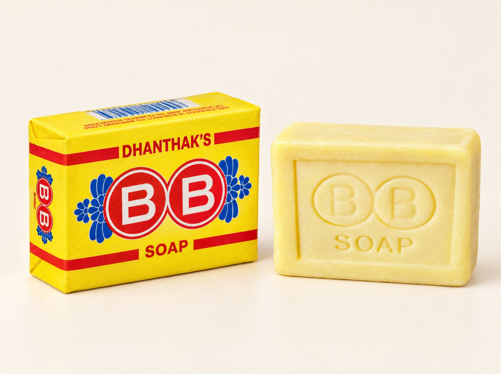 A wrapped BB Soap cake beside an unwrapped cake stamped BB SOAP
